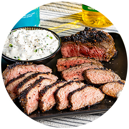 Grilled Peppercorn-Crusted Top Sirloin Steak with Blue Cheese Sauce